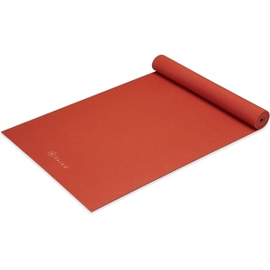 Gaiam Yoga Mat – Premium 5mm Solid Thick Non Slip Exercise & Fitness Mat for All Types of Yoga, Pilates & Floor Workouts (68″ x 24″ x 5mm) | Premium non-slip mat in solid colors. Cushioned support for yoga, Pilates & floor workouts at home or studio.(Sunburnt)